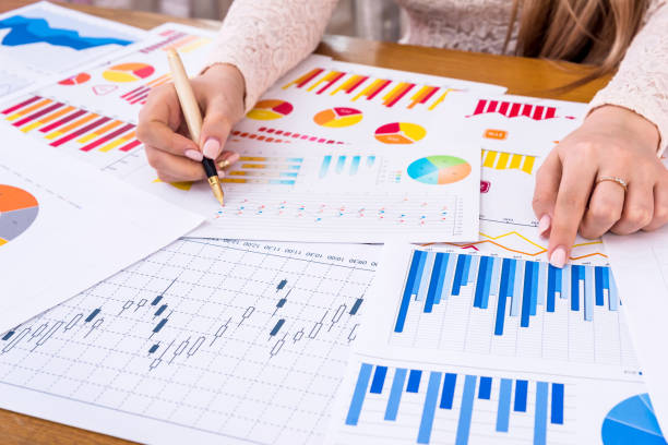 istock Woman manager working with business graphs and diagrams 968910186
