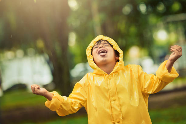 istock Some people hide from the rain, he embraces it 968914208