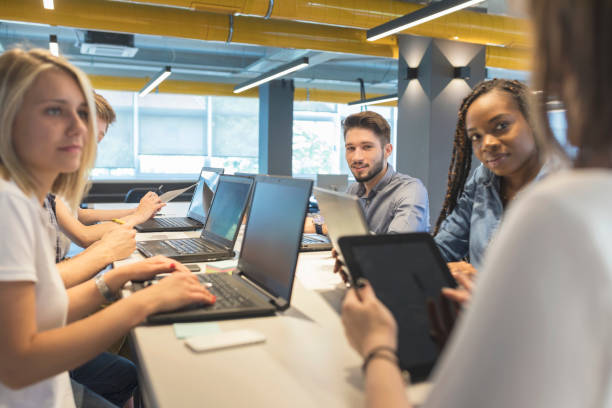 istock Young coworkers in modern office 968917074