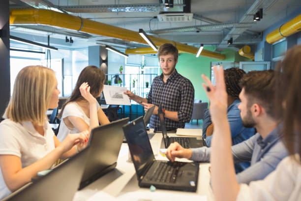 istock Young coworkers in modern office 968917512