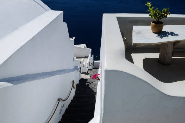 istock Mediterranean terrace against a blue sky and sea 968918028