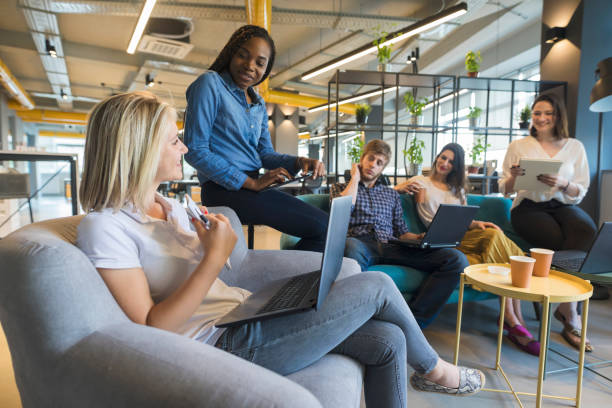 istock Young coworkers in modern office 968918866