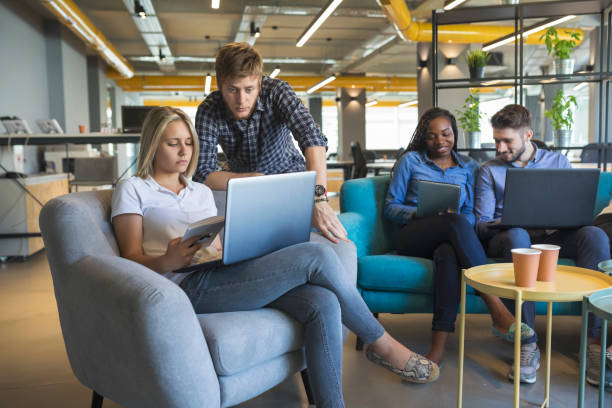 istock Young coworkers in modern office 968920598