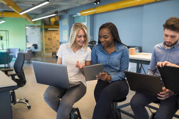 istock Young coworkers in modern office 968920778