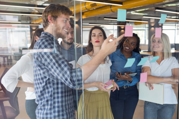 istock Young coworkers in modern office 968920898