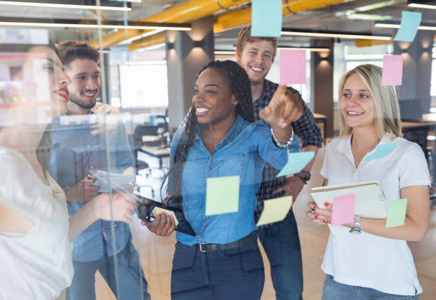 istock Young coworkers in modern office 968920978