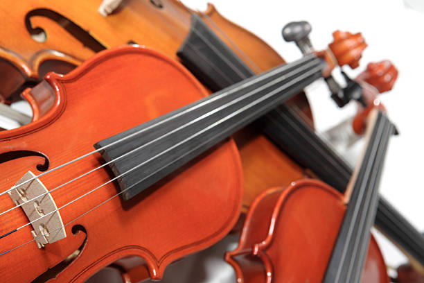 Three violins. Soft focus stock photo