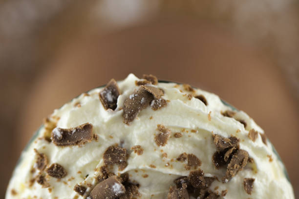 istock Creamy chocolate dessert drink ice cream mousse with whipped cream in studio with macro lens 968924160