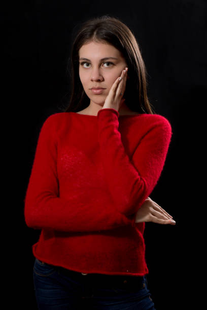 istock Young Lady Studio Portrait Serious When Looking at Camera 968924542