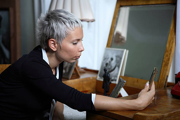 Looking at a photograph stock photo