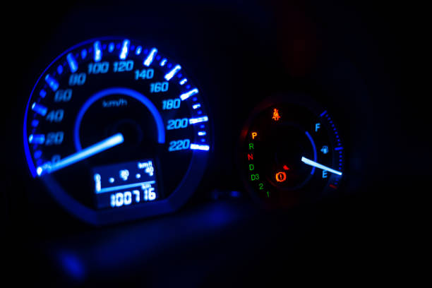 istock Closeup dashboard of mileage car with light blue 968925468
