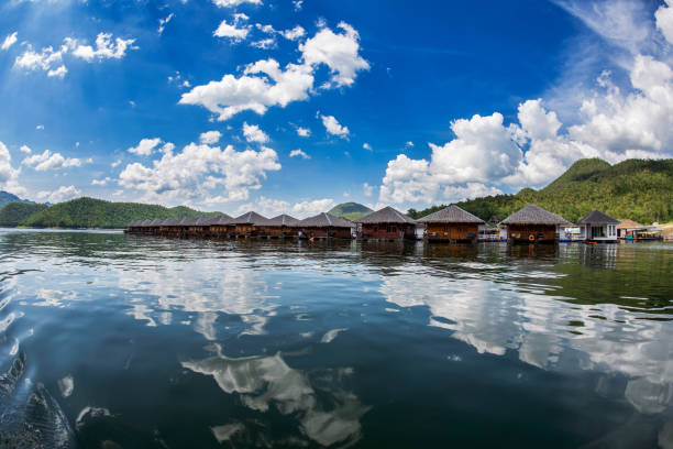 istock Waterfront room in nature with blue sky background 968925482