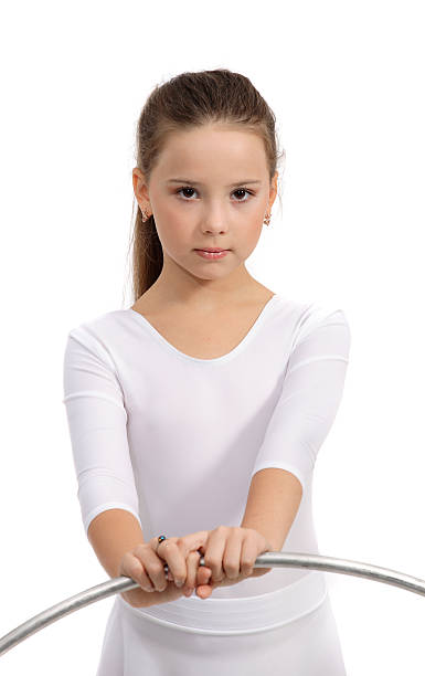 Beautiful little gymnastic girl stock photo