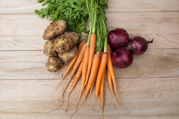 istock Organic potatoes, carrots and red onions 968929512
