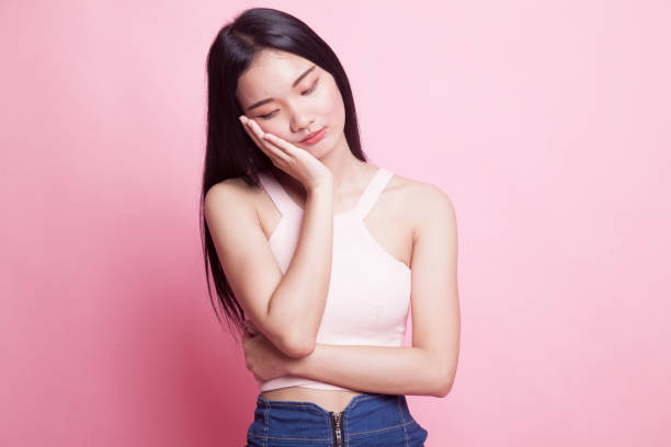 istock Beautiful young Asian woman get bored. 968935336