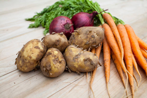 istock Jersey Royal potatoes, red onions and carrots 968935510