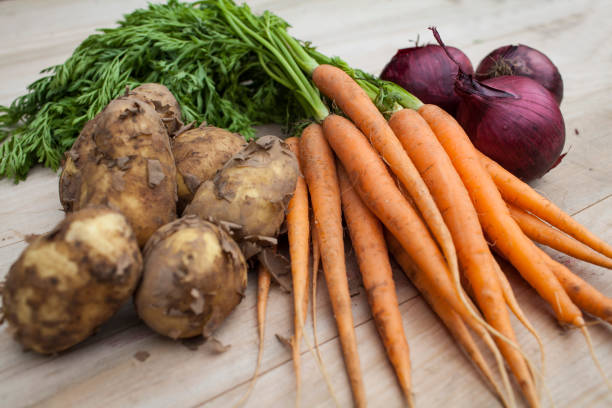 istock Organic potatoes, carrots and red onions 968935702