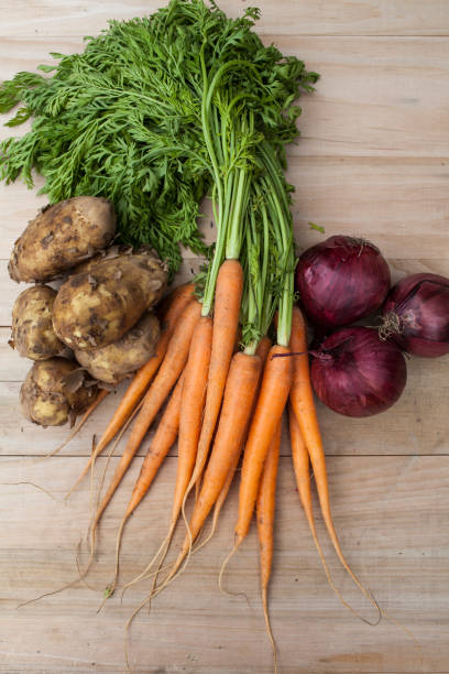 istock Organic potatoes, carrots and red onions 968935786