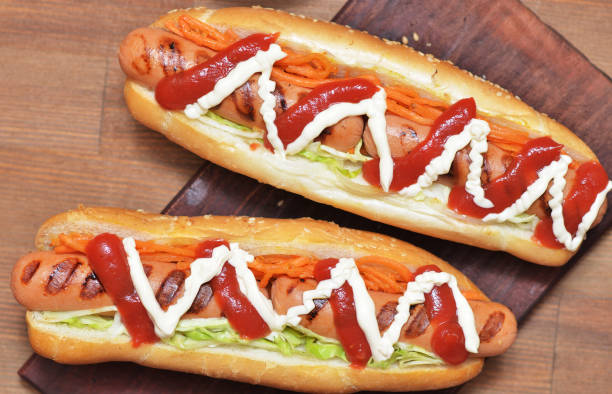 istock Two delicious hot dog with barbecue sausage 968938822