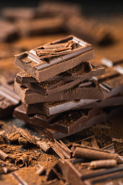 istock Chocolate Sweet Concept on Dark Background 968939646