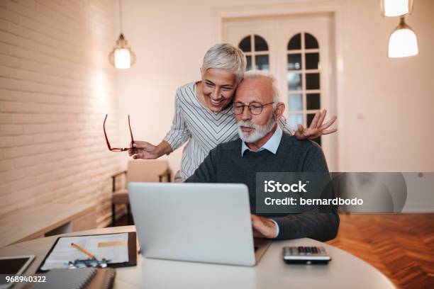 Great News Stock Photo - Download Image Now - Senior Adult, Savings, Couple - Relationship