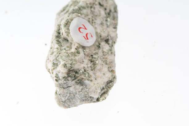 istock gneiss mineral sample studio shot with white background 968944660