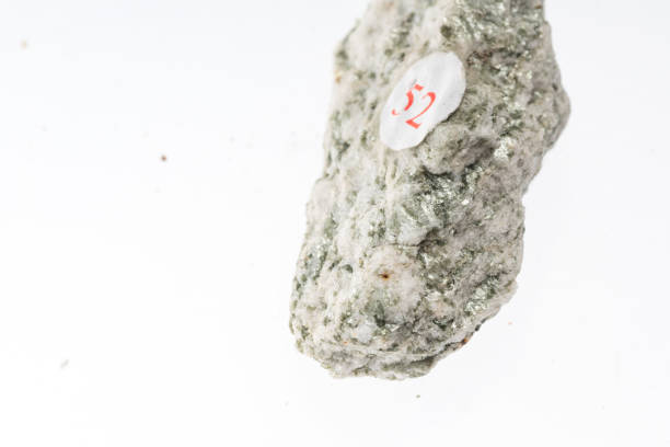 istock gneiss mineral sample studio shot with white background 968944700