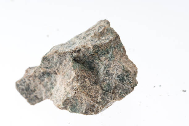 istock epidote skarn mineral sample studio shot with white background 968949132