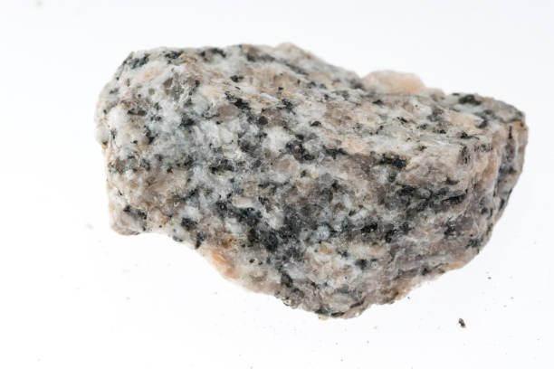 granite gneiss mineral sample studio shot with white background stock photo