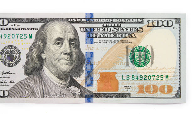 istock One hundred dollars banknotes isolated on white background 968952732