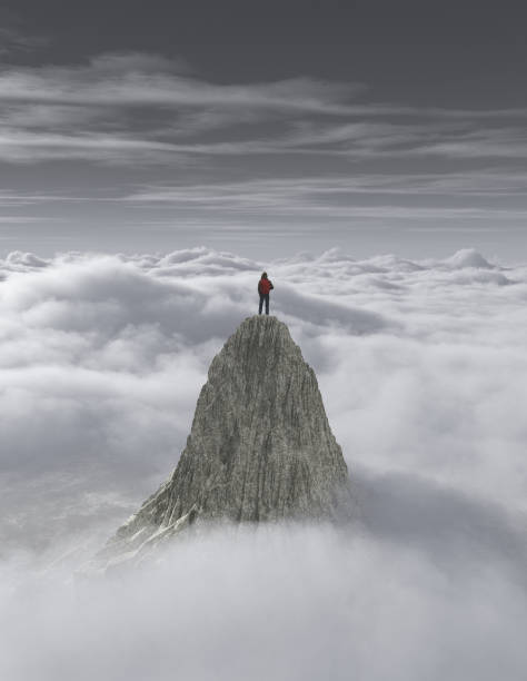 istock Hiker on top of a mountain over  a cloud 968953032