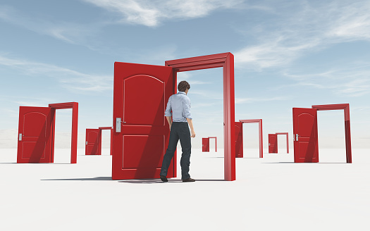 Man enters opened door . The concept of opportunities and choices. This is a 3d render illustration