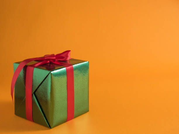 istock gift close-up on color backgrounds 968961590