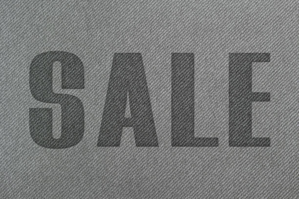 istock SALE  written with gray fabric texture 968972444