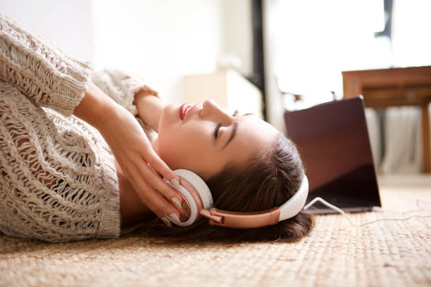 istock young woman sleeping with headphones 968972684