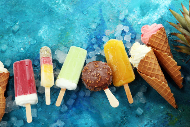 istock Vanilla frozen yogurt or soft ice cream in waffle cone. 968977198