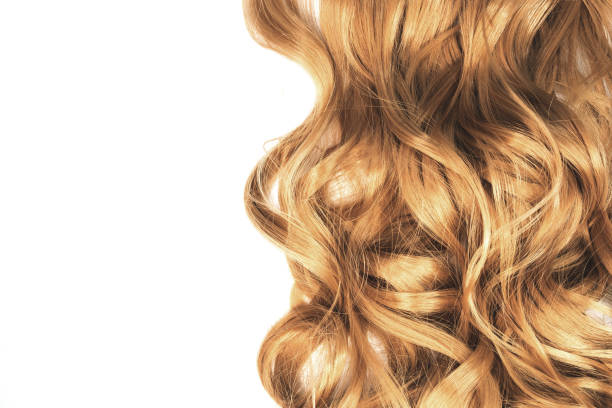 istock long blond wavy hair on white background 968979684