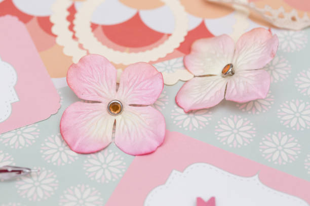 istock scrapbook background. process of creating a postcard - Card and tools with decoration 968980542