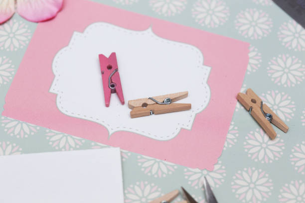istock scrapbook background. process of creating a postcard - Card and tools with decoration 968980558
