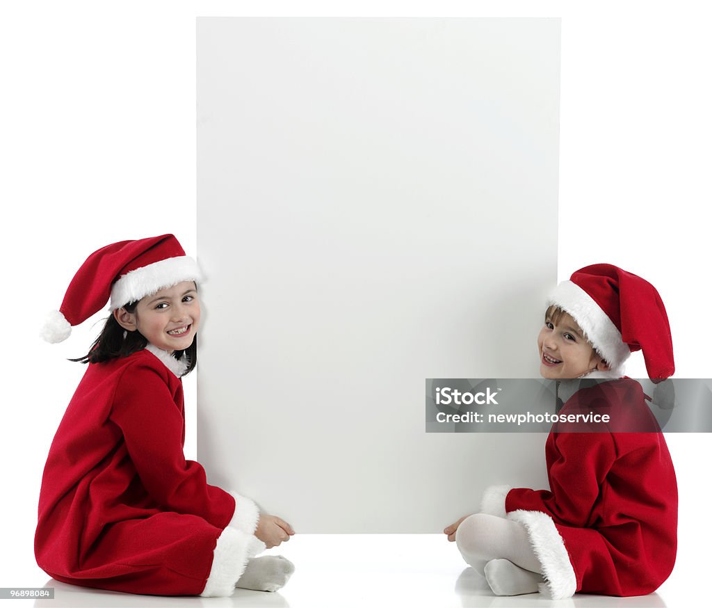 Deux jeunes filles avec santa vêtements - Photo de 8-9 ans libre de droits