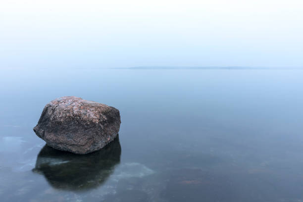 istock Rock on Frozen Sea 968990414
