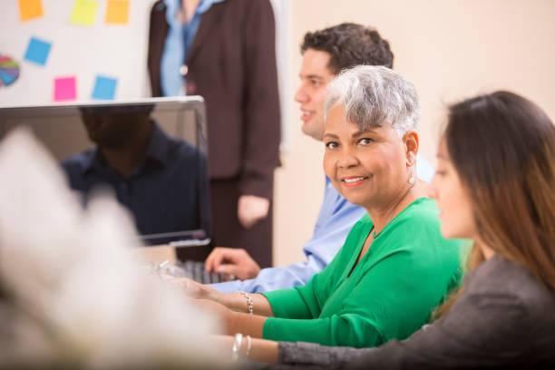 istock Multi-ethnic group of business people in meeting. 968993254