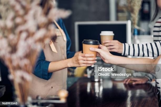 Barista Served Take Away Hot Coffee Cup To Customer At Counter Bar In Cafe Restaurant Coffee Shop Business Owner Concept Service Mind Waitress Stock Photo - Download Image Now
