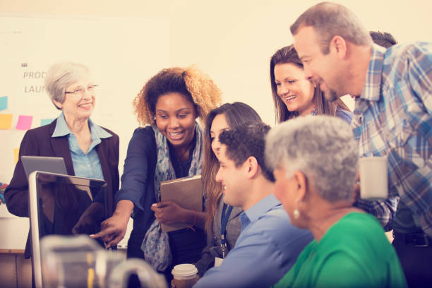 istock Multi-ethnic group of business people in meeting. 968994154