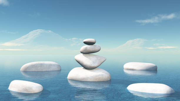 istock 3D balancing pebbles in the ocean 968995186