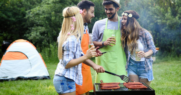 istock Friends making barbecue and having lunch 968996112