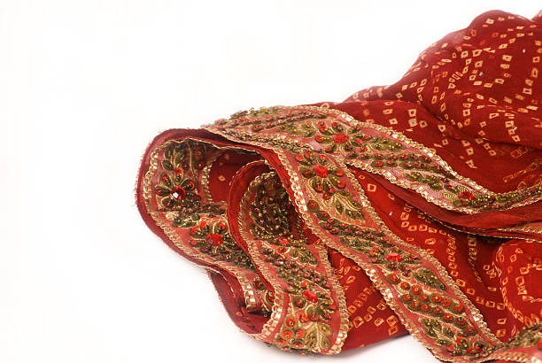 istock red bandhej saree - sari with beads work border 96899782