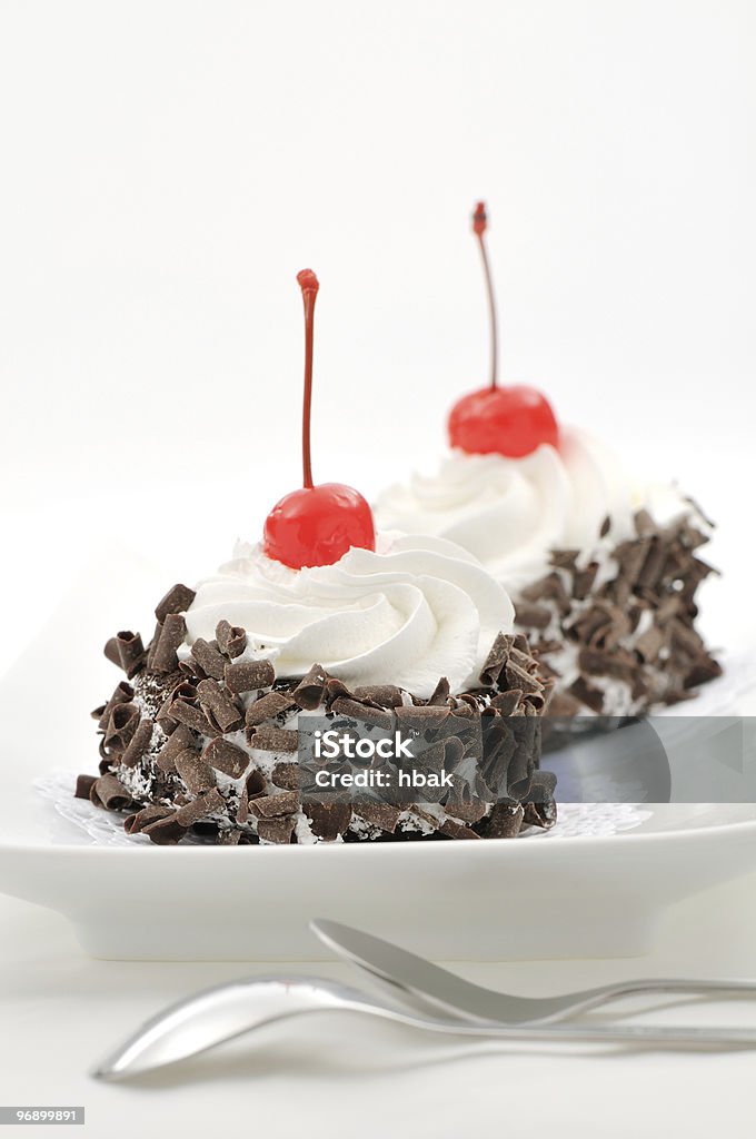 Torte al cioccolato e crema - Foto stock royalty-free di Bianco