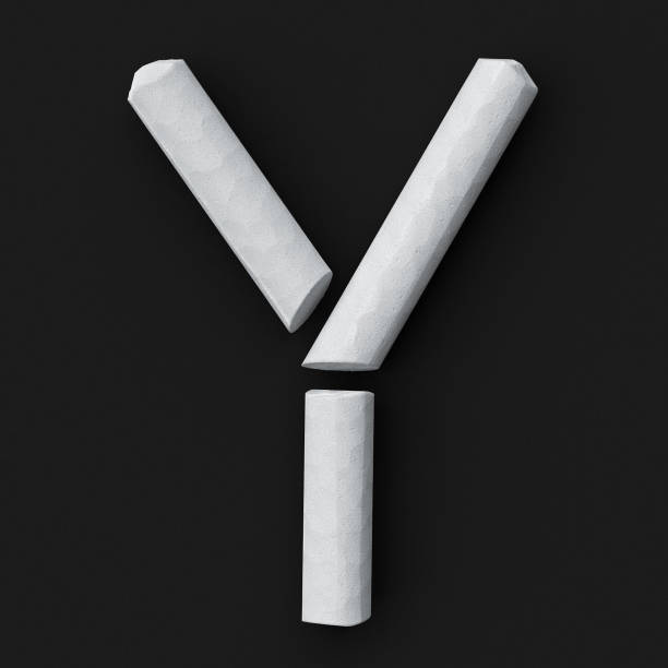 istock White blackboard chalks assembled capital letter Y on rough blackboard, 3D rendered font image 969004224