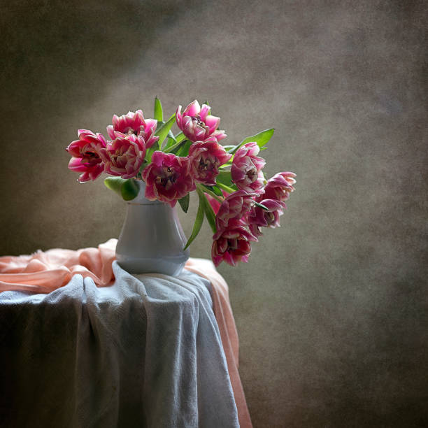 Crimson tulips in a vase